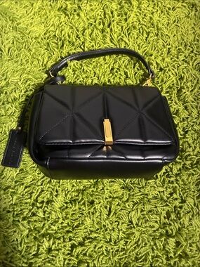 Melie Bianco Black Quilted Crossbody with Gold Accent